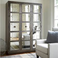 As nouns the difference between armoire and cabinet. Playlist Antique Mirrored Armoire Wardrobe Zin Home