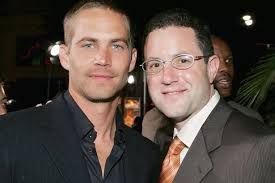 Paul Walker's manager robbed