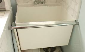 2) is there a sink in the living room? Hidden Storage Under A Laundry Room Sink