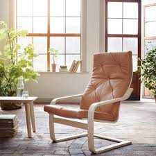 Birch veneer and brown leather. Ikea S Iconic Armchair Just Got A Makeover And It S Good