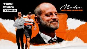 Michael Maguire re-signs with Wests Tigers