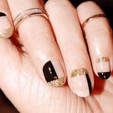 Simple nail designs are so easy to duplicate at home. These 30 Elegant Manicures Prove Black And Gold Nails Are Always In Season