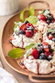 Stalwart of a thousand summer lunch parties, the pavlova, a magnificent billowing cloud of cream and meringue and seasonal fruit, is named after the russian. Mini Pavlova Recipe Meringue Dessert The Cookie Rookie