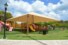 Parents noticed the three playgrounds were not covered, despite online artist renditions of the shade structures will be installed in the coming months. Fabric Shade Structures For Sun Protection At Playgrounds Schools Pools Sports Fields