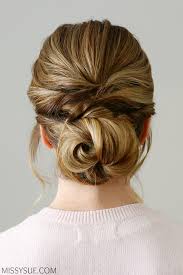 This low bun has a beautiful, boho essence and we love every bit of it's romance and whimsy. Twisted Knot Low Bun Missy Sue