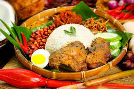It is commonly found in malaysia, where it is considered the national dish. Nasi Lemak Rendang Ayam Malaya Food