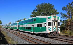 In The Early Stages Of The Afternoon Rush A Westbound Go Train Speeds Into Oakville With A Refurbished Cab Car Leading Go Transit Oakville Commuter Train