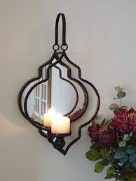 Vintage pair of gold metal candle wall sconces with oval mirrors, rope style oval wall sconce, hollywood regency, gold mirrored sconce. Industrial Vintage Black Wall Mounted Metal Mirror Candle Sconce Holder Home Buy Online In China At China Desertcart Com Productid 118228677
