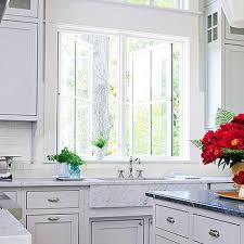carrara marble apron front sink design
