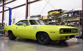 The transmission is a supra sourced a340le aisin automatic. 1971 Plymouth Cuda Schwartz Performance