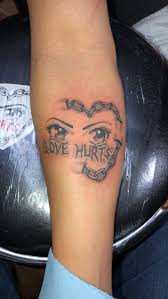 Love Hurts Tattoo Done By Tattoo Artist Ricky Garza Black And Grey Tattoos Tattoo Work Tattoo Artists