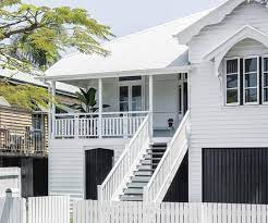 A Classic All White Timber Queenslander In Brisbane Queenslander House Queenslander House Lighting Outdoor