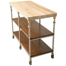 Additional types include workstation, sausage production, and boning tables. Butcher Block Industrial Inspired Stainless Steel And Bronze Kitchen Island For Sale At 1stdibs