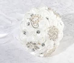 By andrea fowler you can't go wrong with a classic white wedding bouquet. Lillian Rose White Crystal Flower Wedding Bouquet