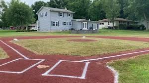 If a fielder catches the ball before it crosses the singles line the batter is out. Man Builds Baseball Field In His Backyard Youtube