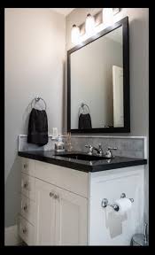 It's all business in this masculine bathroom, so minimalism combined with black and white color scheme always works. Bathroom Design For Men Interior Design Questions