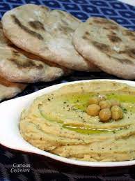 In This Spicy Oregano Hummus Oregano Adds A Rich Herby Ness And A Splash Of Hot Sauce Gives A Slight Kick It Oregano Recipes Cooking With Fresh Herbs Hummus