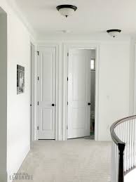 Replace builder window, door and baseboard finishes that have you feeling blah for a solid wood, craftsman style alternative that as you may recall from this post, some of the builder grade finishes in our house were not working for us. Flush Mount Lighting That You Ll Actually Love Making Lemonade