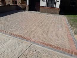 45 degree herringbone paver pattern with running border and header versastone block and cap paved garden wall with eurostone zurich pavers versawall block with split face cap and bondi blend stradapave paving Block Paving Ideas For Somerset Dps Somerset Driveway And Patio Specialists