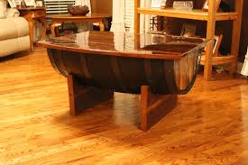 This table is sure to be a conversation starter and will get compliments left and right. Reclaimed Whiskey Barrel Coffee Table The Diy Life