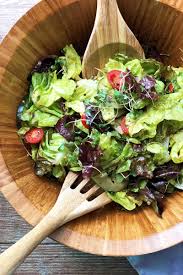 The actual salad is made up of baby spinach, raspberries, blueberries, red onions, feta, and almonds. House Salad Recipe With Cucumbers And Tomatoes Foodal