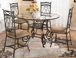 Bianca Round Glass Dining Table With Four Chairs By Signature Design Tenpenny Glass Round Dining Table Round Glass Dining Room Table Glass Dining Room Table