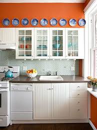 The Top 25 Kitchen Color Schemes For A Look You Ll Love Forever Orange Kitchen Walls Kitchen Cabinets Color Combination Warm Kitchen Colors