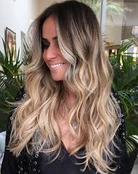 Beach wedding hair styles with flowers. 20 Perfect Ways To Get Beach Waves In Your Hair 2021 Update