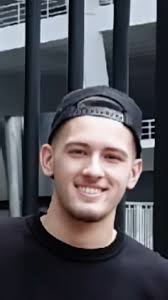 Justin Hubert Next to People