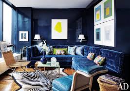The One Piece Of Furniture You Never Knew You Needed Until Now Navy Blue Living Room Lacquered Walls Blue Living Room