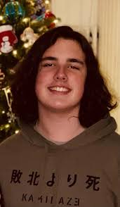 This is my grandson Michael. Broke my heart to cut all of this hair off.  Anyone that knows me knows I like long hair. Still so handsome! 😁❤