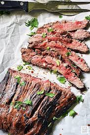 Marinated In The Best Flank Steak Marinade Ever My Recipe For Cast Iron Flank Steak Is Delicio Cast Iron Flank Steak Marinade Flank Steak Flank Steak Recipes