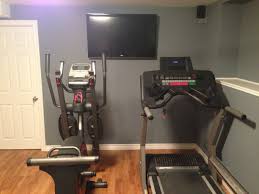 A treadmill, elliptical, or stationary bike can easily fit in a garage, and you can even install a stereo system. Small Space Diy Home Gym Novocom Top