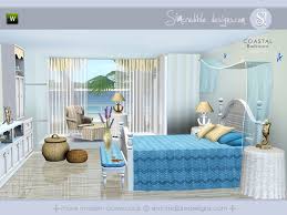 A pretty modern coastal bedroom with beadboard walls, blue bedding, a nautical artwork, wooden furniture and a jute rug. Simcredible S Coastal Bedroom