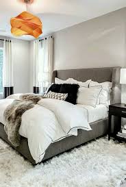 Gray And White Master Bedroom With Light Gray Walls And White Fur Rug Remodel Bedroom Cozy Master Bedroom Bedroom Design