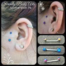 Healed Surface Tragus Piercing With Crystal Blue Meridian Gem Ends From Industrial Stre Raw Crystal Stud Earrings Tragus Piercing Jewelry Circle Earrings Studs