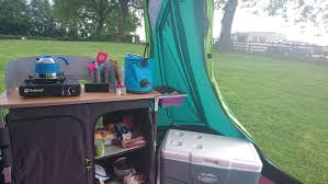 Making a camp cooking station to cook a family feast in! Camp Kitchen Essentials For Your Next Camping Trip