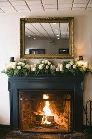 White And Green Mantel Garland Fireplace Mantel Decor Christmas Fireplace Mantels Black Fireplace Mantels