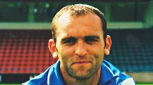 Tributes paid to former Rochdale AFC player after 'sudden and devastating'  death