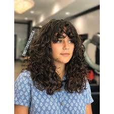 Short medium length hairstyles fall between the ear lobe and all the way down to the base of the short medium hair­ is the magical length. 25 Best Shoulder Length Curly Hair Cuts Styles In 2021