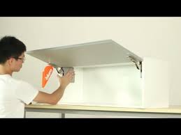 Traditional cabinets require you to pull the doors out to open them. Small Flip Up Door Wall Cabinet Youtube