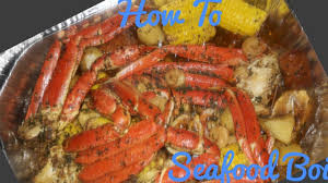 Mix with a large spoon then add in the lemons, garlic bulb, fingerling potatoes, corn, and kielbasa. How To Make A Seafood Boil In A Bag Crab Legs Shrimp Crab Boil In A Bag Youtube