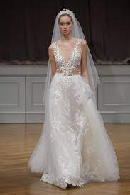 Christine Wedding Gown By Livne White Is A V Neck Ivory Wedding Gown With An All Lace Applique Top With Stone And Pearl Details A Unique Open Back With Lace