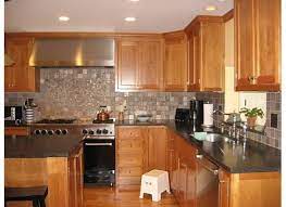 Cherry wood cabinets will complement all types of kitchen designs. Light Cherry Cabinets What Color Countertops Re What Color Counter With Your Natural Cherry Cabinets Cherry Cabinets Kitchen Cherry Kitchen Kitchen Redo