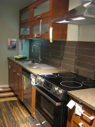 Pictures Of Ikea Kitchens Flip Up Ikea Wall Cabinets Brown Tile Backsplash One Wall Kitchen Small Kitchen Design Layout Kitchen Layout