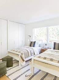Minimalist Mid Century Bedroom With Two Beds Minimalist Bedroom Bedroom Design Master Bedroom Design