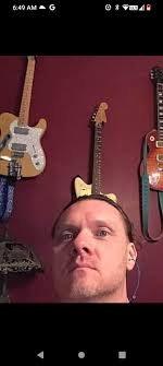 Will removing laminate improve guitar sound?