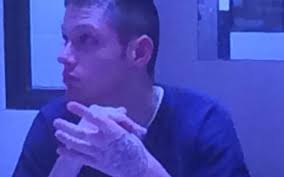 Knife-wielding suspect found hiding under truck in Olympia