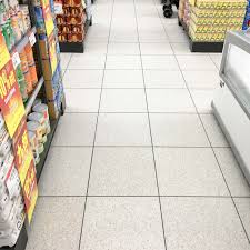 Perfect for creating that charming country farmhouse look in a bathroom or need a helping hand finding the correct adhesive and grout for your chosen tiles? Tektile Cream Terrazzo Dark Grey Grout Luxury Vinyl Tile Revolutionary Flooring Solution Tektile Australia