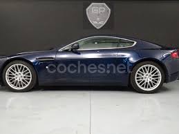 Image result for Midnight Blue 2010 Aston Martin